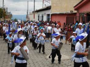 The school band draws smiles from the community