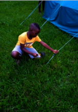 Nyiko preparing his tent for the night!