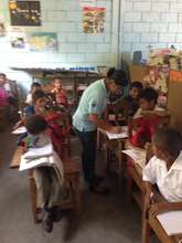 Secondary school students teaching primary school