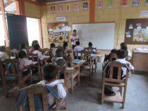 Our assistant teachers taking classes in Primary