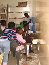 Binti Members Painting Mural in CFK Meeting Hall