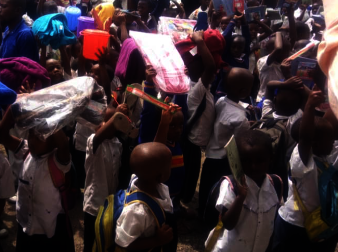 Bujovu school children receive bags and books