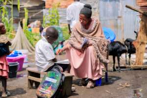 Child doing homework in Goma