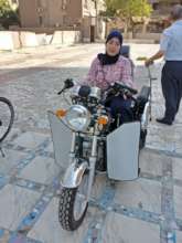 Aya on her motorcycle