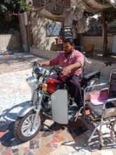 Mahmoud riding his equipped ride