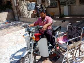 Mahmoud riding the Accessible motorcycle
