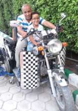 Saleh and his Son on their Tricycle