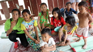 Ms Sophearum with children in Prey Veng province