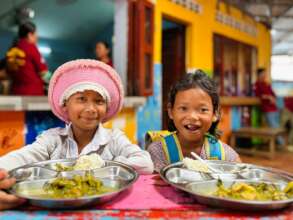 Enjoying a hot school lunch with friends