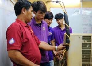 Students learning about air conditioners