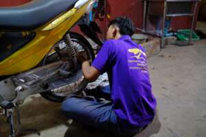 One of our students learning moto repair