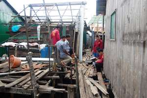 Helping poor families with house repairs