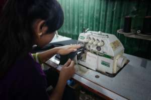 student in the sewing program
