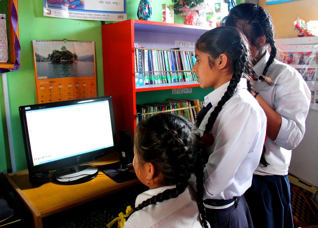 Provide six computers for Nepali school students