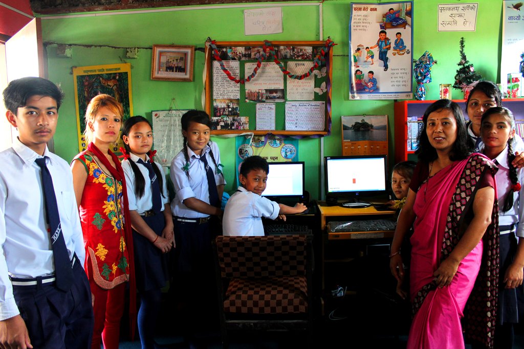 Provide six computers for Nepali school students