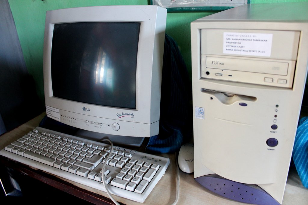 Provide six computers for Nepali school students