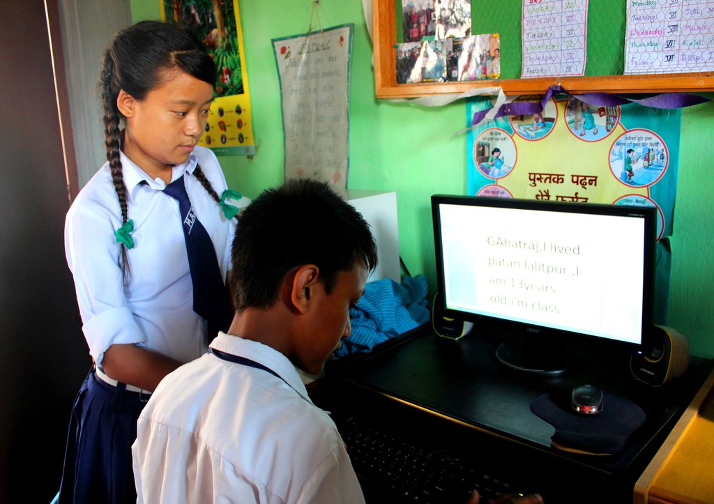 Provide six computers for Nepali school students