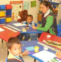Angel and Dylan with teacher, Carla