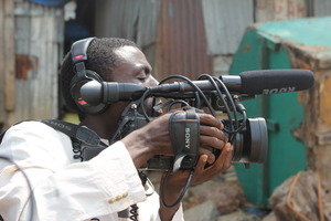 MJ Sessy Kamara films at Tamba Kula Wharf