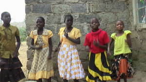 young girls sing.