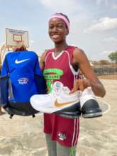 Mary receives her bag and shoes.