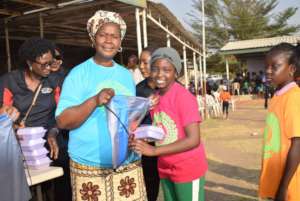 A parent with her child at the camp
