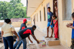 Timeout4Africa Covid relief team at campers home.