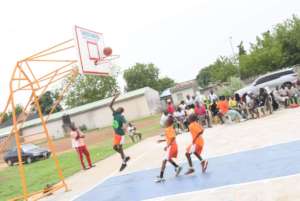 Kids playing at the completed court.