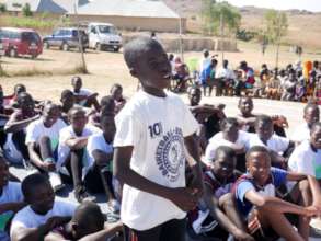 A clinic attendee asking questions.