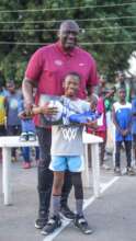Mr Kolo with one of our winners. He received shoe.