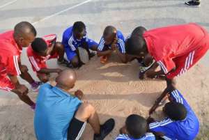 Coach Nelly doing the best he can do planning.