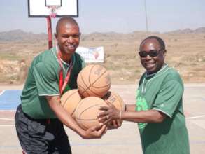 Presentation time with Bishop and coach Nelly.