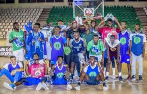 A group picture of players gifted shoes