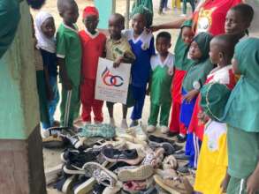 At a distribution event in school.