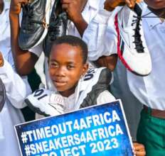 Our young basketball player at give away.