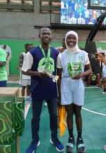 Coach Sani with our a girl medalist.