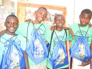 Kids enjoying drawstring bags with school supplies