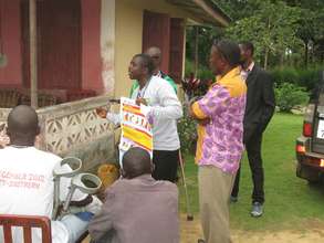 Phillip Sesay teaching the community about Ebola