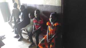 Children await their injections