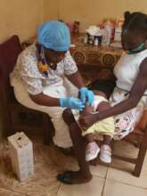 A clinician administering care