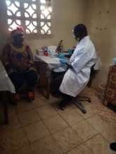 Patient Lab Test Being Explained by Lab Assistant