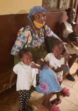 Mother Brings Children for Treatment