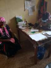 Screener Doing Medical History on Patient