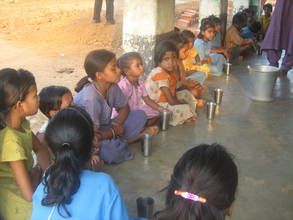Children getting soymilk - Mathikai school