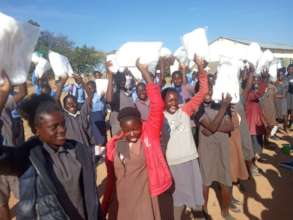 Distribution of mosquito nets - Singwamba School