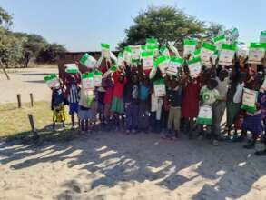 School children receive mosquito nets