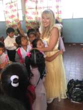 Smiles Forever Founder Sandy as golden tooth fairy