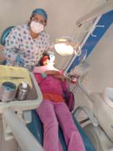 Dr. Quinteros with Agape Foundation patient