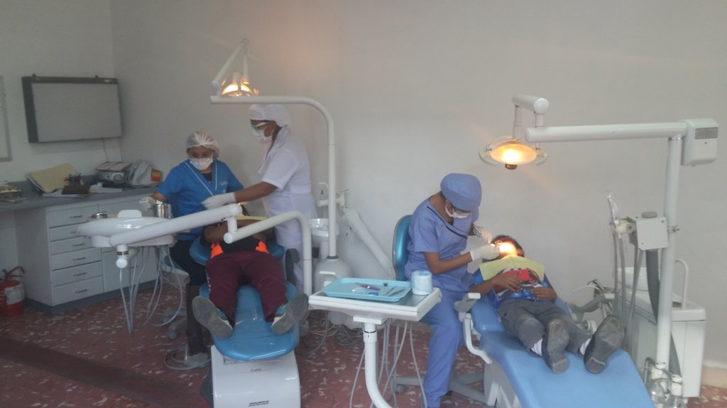 Geovanna & Dr. Apata treating boys in detox home