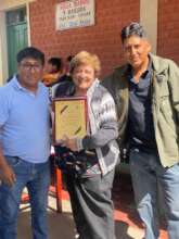 Sharon Golightly with award
